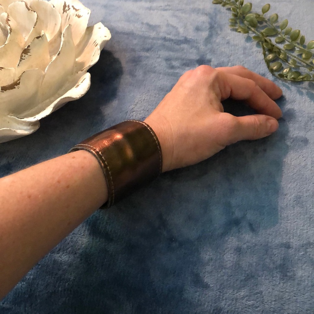 Hidden money compartment in this snap bracelet!